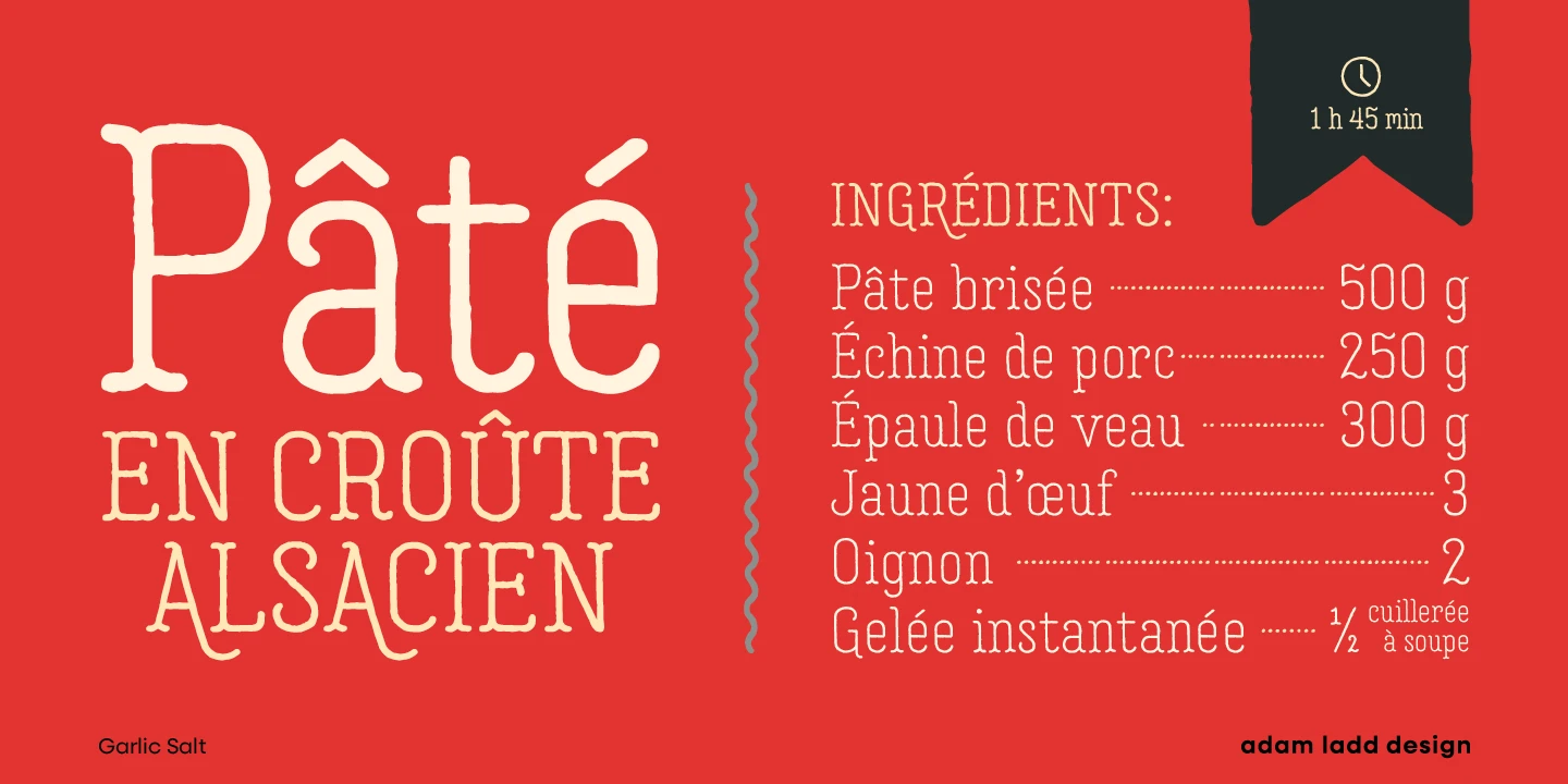 Garlic Salt font by Adam Ladd Design — the words “Pâté en Croûte Alsacien” in a large serif font, and a list of ingredients in a smaller serif font, separated by a wavy line.