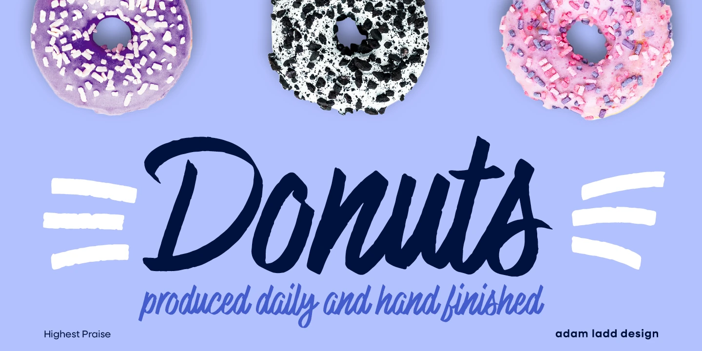 Highest Praise font by Adam Ladd Design — three donuts with sprinkles above the word “Donuts” in a bold, connected script, with the phrase “produced daily and hand finished” below it in a smaller, upright script, flanked by three horizontal white brush strokes on each side.