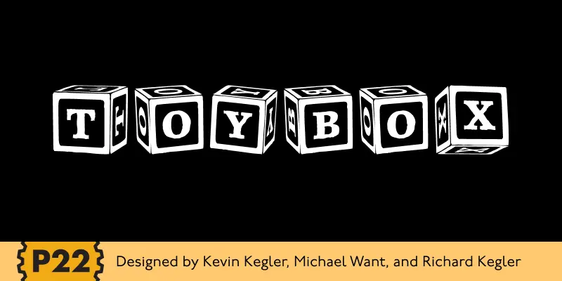 ToyBox font by P22 Type Foundry — the word TOYBOX spelled out on six white-and-black toy blocks on a black background, with a yellow footer bar at the bottom