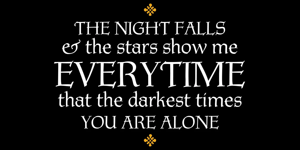 Tyndale font by P22 Type Foundry — the words THE NIGHT FALLS, ampersand the stars show me, EVERYTIME, that the darkest times, YOU ARE ALONE in a white, high-contrast serif typeface with gothic influences, set against a black background with small orange knot motifs above and below