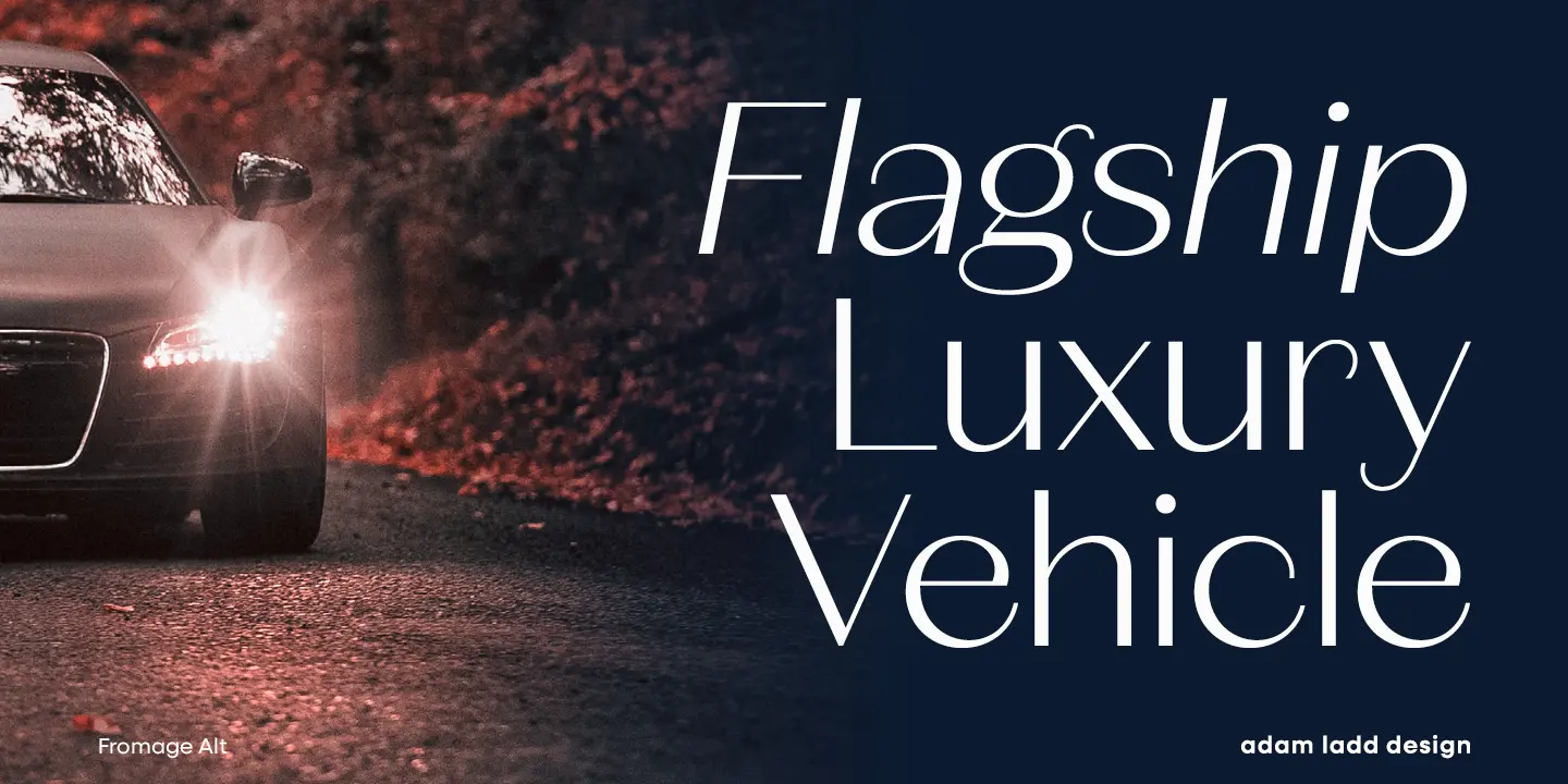 Fromage font by Adam Ladd Design — a dark car with bright headlights on a road, with the words “Flagship Luxury Vehicle” in italic sans serif letters