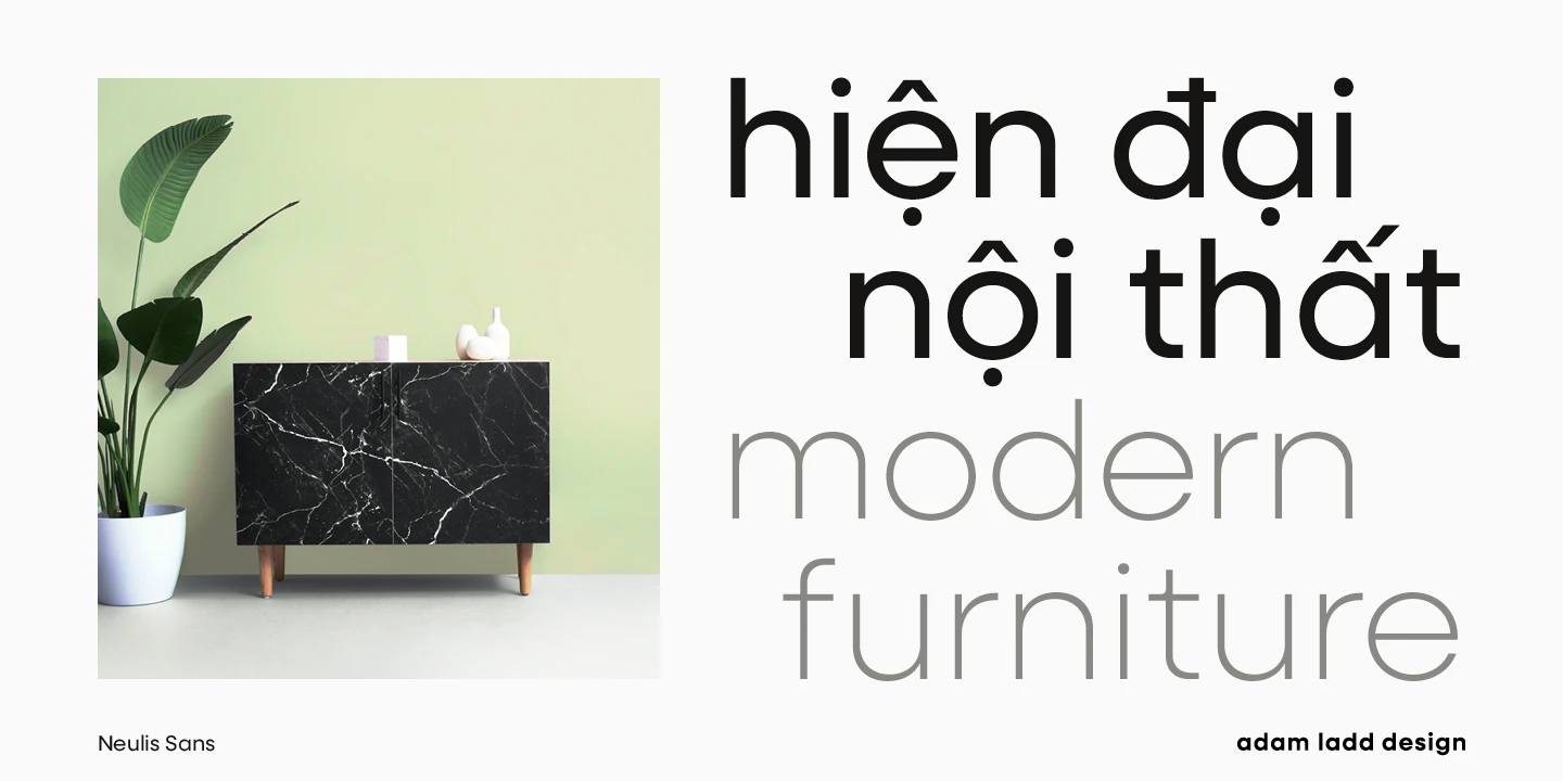 Neulis font by Adam Ladd Design — a black marble cabinet with a plant next to it, and the words “hiện đại nội thất” in black sans serif, and “modern furniture” in gray sans serif