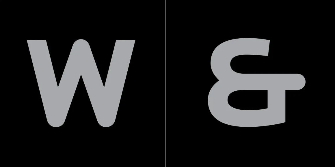 Locator font by Process Type Foundry — the letter W and an ampersand in a light gray sans-serif typeface, separated by a thin vertical line on a black background