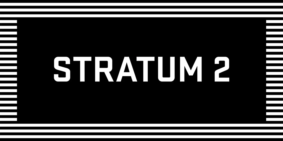 Stratum 2 font by Process Type Foundry — the word STRATUM in white, blocky, sans-serif lettering on a black background, framed by horizontal stripes at the top and bottom and vertical stripes on the left and right sides