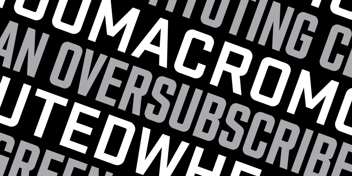 Stratum 2 font by Process Type Foundry — the words RECONSTIT, DUMACROMO, VERSUR, and TE set in a bold, squarish sans-serif typeface, arranged in diagonal, alternating white and grey lines on a black background